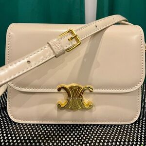Cream color with gold bag